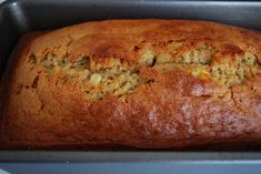 a loaf of banana bread in a metal pan