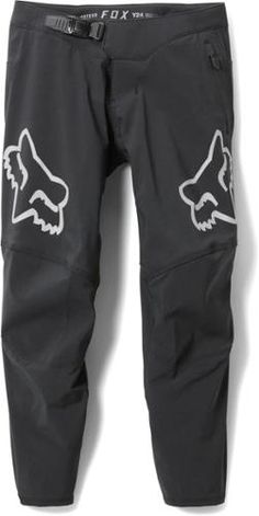 a pair of black pants with white fox patches on the bottom and one leg is shown