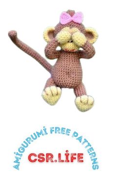 a crocheted monkey with a pink bow on it's head and arms