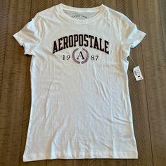 Women’s Large (Fits Smaller, More As A Medium) Aeropostale T-Shirt - New With Tags Aeropostale Outfits, Trashy Outfits, American Eagle Shirts, Aeropostale Shirts, Sleep Clothes, Winter Outerwear, Usa Shirt, Graphic Tops, Swaggy Outfits