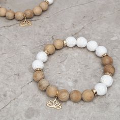 Matte Bead Bracelets, White Lava Bead Bracelet, Neutral Bead Bracelet, Women Beaded Bracelets, Natural Bead Bracelets, Beaded Bracelet With Charm, Lava Bead Bracelet Ideas, Rock Bracelets, Round Beaded Bracelets