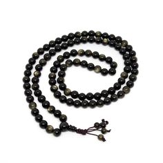 Gold Sheen Obsidian Zen 108 Bead Buddhist Mala - Prayer Beads - 8mm. Qualities or Properties of Gold Sheen Obsidian: Used to clear, absorb and shield negative energies. Purifies your auric field. Enhances the power of manifestation. Attracts prosperity. Helpful in providing direction and aiding in achieving goals. A stone of wisdom. Useful in healing and balancing your energy fields. A perfect guide and protector stone. Bead Size: 8mm. Gold Sheen Obsidian, Power Of Manifestation, Auric Field, Buddhist Mala, Sheen Obsidian, Achieving Goals, 108 Bead, Energy Field, Buy Gold