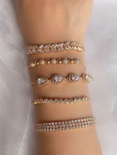 Spoil yourself and add some luxury to your look with these shimmering Dreamy Rose Gold bracelets. Each 24K rose gold plated piece is designed to sparkle and shine with a high quality finish, so you can feel like a million bucks! Perfect for those special occasions (or just looking fabulous, everyday!). Short Gown Styles For Material, Rose Gold Bracelets, Gown Styles, Short Gowns, Gold Bracelets, Sparkle And Shine, Spoil Yourself, Rose Gold Bracelet, Rose Gold Color