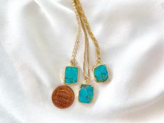 **Each piece in my shop, I personally create and photograph. (All photos are property of The Cord Gallery LLC) Thank you for supporting my small business.Rectangle Turquoise Pendant Necklace Turquoise never goes out of style and these Turquoise Pendant Necklaces are a great way to add a pop of color to any outfit. Features genuine Turquoise, rectangle cut and framed in gold electroplating. Hangs on your choice of chain.Pendants measure 10mm x 12mm. Each gemstone will be chosen at random to creat Rectangular Blue Turquoise Necklace For Gifting, Blue Rectangular Turquoise Necklace Gift, Blue Box Chain Necklace As A Gift, Blue Box Chain Necklace For Gift, Handmade Rectangular Turquoise Necklace For Gift, Turquoise Square Pendant Necklace As Gift, Turquoise Necklace With Square Pendant As Gift, Turquoise Rectangular Pendant Necklace As Gift, Turquoise Square Pendant Necklace For Jewelry Making