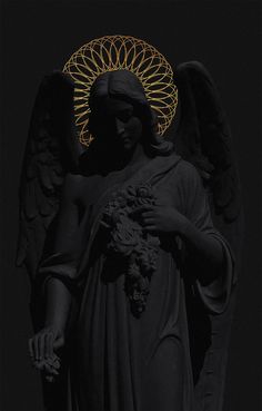 an angel statue with flowers in his hand and wings on it's back, against a black background