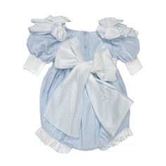 Petite Maison Kids. Made in Turkey. Baby blue linen romper with beading on bodice and adorable shoulder bows. Large tie bow in the back. Faux pearl buttons closure. Soft cotton lining. Composition: 70% Cotton, 30% Linen.