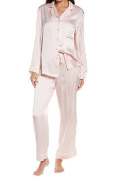 Drift off to dreamland in the luxury of whisper-light silk pajamas made with classic menswear influences. 28" top length; 29" inseam; 19" leg opening; 11 1/2" front rise; 14 1/2" back rise (size Medium) Top has front button closure; notched collar; long sleeves; chest patch pocket Pants have drawstring waist 100% silk Dry clean or machine wash, line dry Imported Women's Clothing Elegant Relaxed Fit Sleepwear For Pajama Party, Elegant Relax Fit Sleepwear For Pajama Party, Silk Sleepwear For Pajama Party, Elegant Silk Sleepwear With Relaxed Fit, Elegant Sleepwear For Pajama Party In Spring, Silk Sleepwear For Spring Lounging, Elegant Relaxed Fit Sleepwear Long Pants, Elegant Relaxed Fit Sleepwear, Spring Silk Sleepwear In Relaxed Fit