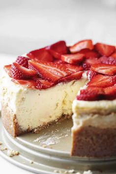 a cheesecake with strawberries on top and the words, 10 keto cheesecake