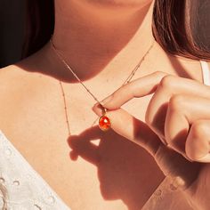 This beautiful oval Sunstone cabochon necklace is sure to catch the light and the attention of your friends! Each stone is bezel set in 925 sterling silver or plated with either 18k vermeil gold or 18k rose gold. It's perfect on its own or layered with other necklaces! Gemstone is 8 mm x 10 mm Please note that each pendant is handmade and there may be some slight variations from listing photo. Available in: * YELLOW 18K VERMEIL GOLD.  * ROSE 18K VERMEIL GOLD. * BRIGHT STERLING SILVER.  We have t Oval Amber Birthstone Jewelry, Dainty Oval Cabochon Birthstone Jewelry, Orange Oval Necklace For Gift, Gold Oval Cabochon Jewelry As A Gift, Gold Oval Cabochon Jewelry Gift, Oval Pendant Jewelry With Adjustable Chain For Gift, Oval Amber Necklace For Anniversary, Spiritual Oval Jewelry With Adjustable Chain, Oval Orange Birthstone Jewelry