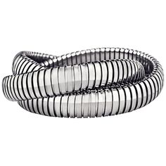 two silver bracelets with black and white stripes on each side, one in the shape of a spiral