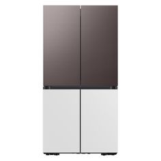 a white and brown refrigerator freezer sitting next to each other