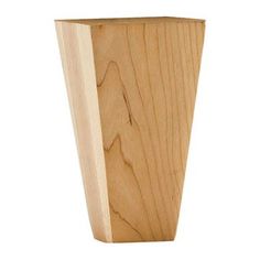 a tall wooden vase sitting on top of a white surface with wood grained edges