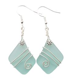 the earrings are made with sea glass and silver wire