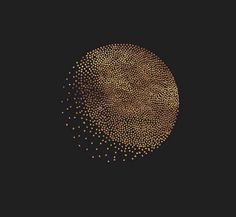 a black background with gold dots in the shape of a circle on top of it