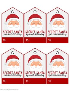 four tags with santa claus's face and the words secret santa written on them