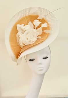 Ladies show stopping race day bespoke headpiece On secure band with comb Lightweight and easy to wear Choice of bespoke colours available  Made to order Express service upon request  Modern and chic design Standard size is approximately 36cm but can be reduced to individual requirements