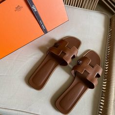 Oran Tan Sandal Hermes Oran Sandals Outfit, Hermes Slippers, Hermes Oran Sandals, Sandals Outfit, Tan Sandals, Hermes Shoes, Hermes Oran, Hermes Paris, Hermes Bags