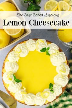 a lemon cheesecake on a table with fresh lemons in the background