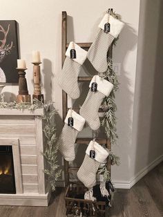 Farmhouse stockingsstockings on ladderblack and white Christmasstocking name tags Tafel Decor, Cozy Christmas Decor, Holiday Deco, Neutral Christmas, Country Christmas Decorations, Christmas Decor Inspiration, Christmas Themes Decorations, Tree Themes, Holiday Vibes