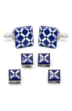 Elevate your look with these silvertone metal cuff links and studs featuring mother-of-pearl, onyx and blue stone set in an intricate diamond argyle pattern. 5/8" square cuff links; 1/3" square studs Metal/mother-of-pearl/onyx/stone Imported Designer Silver Clip-on Jewelry, Elegant Silver Cufflinks, Elegant Blue Cufflinks For Business, Elegant Jewelry With Polished Finish For Business, Classic Blue Jewelry For Business, Elegant Polished Finish Jewelry For Business, Elegant Polished Jewelry For Business, Elegant Adjustable Silver Cufflinks, Luxury Blue Cuff Jewelry