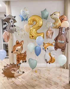 the balloons are shaped like animals and numbers