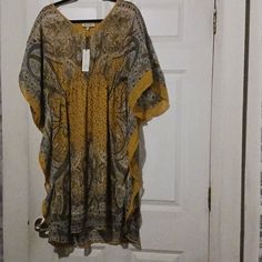 Bundle Any Of The Shirts Or Dresses With The Flower Emojis 3 For $20!! Flowy, Comfortable, Yellow Summer Dress. Lightweight With Liner. Paisley Design. Cinched Waist. Hits Just Above The Knee On Me(I Am 5'7") New With Tags . ***Bundle For A Great Deal**** Yellow Casual Beach Cover-up Dress, Casual Yellow Beach Cover-up Dress, Yellow Short Sleeve Beach Cover-up Dress, Yellow Summer Dress, Aztec Print Dress, Orange Midi Dress, Midi Dress Plus Size, Long Midi Dress, Floral Sundress