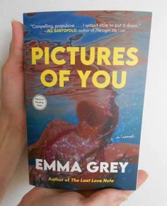 the book pictures of you by emma grey is being held in front of a white wall