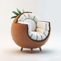 a chair made out of coconut and marshmallows is sitting in the shape of an egg