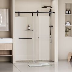 a bathroom with a walk in shower next to a white sink and wooden shelfs