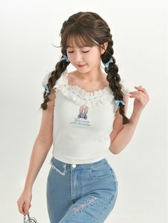 This charming top features a delightful Judy embroidery from the popular movie Zootopia, adding a touch of whimsy to your outfit. The delicate lace collar adds a sweet and feminine touch, perfect for adding a hint of romance to your look. This top is a versatile piece that can be paired with a variety of bottoms to create different looks.   Please note that this product includes only the top, other items shown are for styling purposes and can be purchased separately.  Garment Size   	 		 			Size Cute Tops With Ruffled Collar, Cute White Top With Lace Collar, Cute White Tops With Lace Collar, White Tops With Cute Collar In Feminine Style, White Feminine Top With Cute Collar, Spring Cute Tops With Ruffled Collar, Cute Sleeveless Top With Lace Trim, Feminine White Top With Cute Collar, Cute Sleeveless Lace Trim Tops