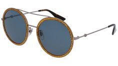 Gucci GG0061S PPHP1443 sunglasses with ruthenium and shiny glitter gold frame and solid blue lens. Influential, innovative and progressive, Gucci is reinventing a wholly modern approach to fashion. Under a new vision of creativity, the House has redefined luxury for the 21st century, further reinforcing its position as one of the world’s most desirable fashion houses. Eclectic, contemporary, romantic: Gucci products represent the pinnacle of Italian craftsmanship and are unsurpassed for their quality and attention to detail. Sun Woman, Logo Sunglasses, Chloe Kids, Blue Lens, Sunglasses Logo, Sunglasses Model, Gucci Eyewear, Gucci Logo, Round Frames