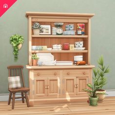 a wooden hutch sitting next to a chair and potted plant