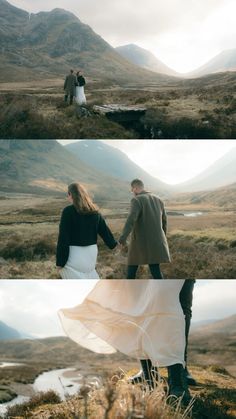 two people holding hands and walking in the mountains