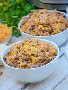 two white bowls filled with rice and meat next to an instant pot pressure cooker