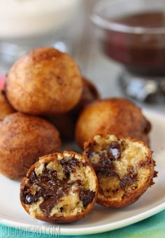 some chocolate chip muffins on a white plate