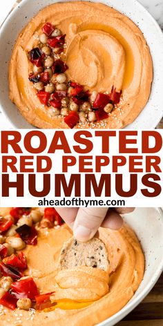 roasted red pepper hummus in a white bowl with a hand dipping them into the dip