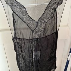 Elegant Chic Top Classic And Sexy Black Sheer Sleeveless Camisole, Black Sheer V-neck Sleepwear, Black Sheer Tops For Night, Black Sleeveless Sheer Sleepwear, Sheer Black Sleeveless Sleepwear, Black Sheer Sleeveless Sleepwear, Sleeveless Black Sheer Sleepwear, Black Sheer Camisole For Night, Black Sheer Chic Camisole