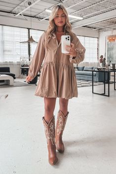 Obviously you are good to be late if you look this good!! This long sleeve button up dress is perfect for Fall!! Button down collared long sleeve bubble hem dress Material is Cotton with Polyester lining Hang to dry SHOP THE LOOK Small Medium Large Length 34.5” 35.5” 13” Bust 19” 20” 21” Short Dress Cowboy Boots, Maxi Dress With Cowboy Boots, Summer Dress With Cowboy Boots, Oversized Button Up Shirt Dress, Country Chic Clothing, Dress With Cowgirl Boots, Nfr Vegas, 2025 Vibes, Country Chic Outfits