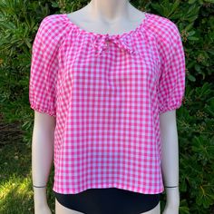 This is a super cute pink gingham blouse I love the little tie on the chest and the poof sleeves! It's also sort of cropped so that just makes it extra cute! It's very lightweight and perfect for summer My guess would be best fits up to a medium but pls see measurements as there is no tag on this! Measurements as follows: Pit to pit is 19" inches  Length is 22" inches I ship priority mail with tracking! Thanks for looking :) Gingham Blouse, Shop For Clothes, Pink Gingham, Sequin Top, Vintage Shop, May 20, Cute Pink, Vintage Pink, Womens Clothing Tops