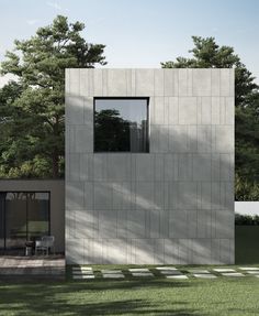 a modern house made out of concrete blocks