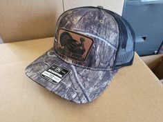 Each of our caps are custom made to order items that have a leather engraved patch on them. We offer them in many diffrent colors also. Each cap is a snapback flatbill one size fits most these hats are Richardson 112 all camo hats are a 5 panel hat solid colors are 6 panel Each hat will ship free to all 50 us states in a 7x7 box. No crappy bags that leave your poor hat smashed. Hunting Hat, Leather Engraving, 5 Panel Hat, Camo Hats, Turkey Hunting, Trucker Cap, Camo, Caps Hats, Accessories Hats