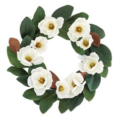 a wreath with white flowers and green leaves