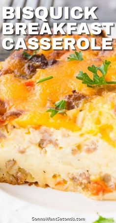 a close up of a slice of casserole on a plate with parsley