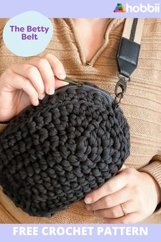 a woman holding a black crochet purse with the text, free crochet pattern