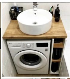 a washer and dryer in a small bathroom