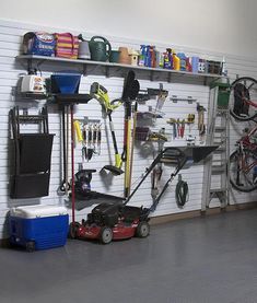 there is a garage with many tools on the wall