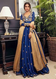 ✨Beautiful and elegant blue anarkali suit for all size women, silk long Anarkali,sequens hand work  anarkali ,plus size wedding floor length anarkali.  Coblet blue floor length hand work embroidered Anarkali,it has beautiful embroidery of sequin, zardozi, and zari over the front and small motifs all over the front and back flair.  It has gold orgenza dupatta with small motifs all over.  ✨This dress can be customise in any other colour and in all size, please contact us regarding any changes if you want.We will make this dress as per your choice. ✨Please note that this outfit is not a replica of low quality. We make garment on the order of our customers.we don't make it in bulk, This will be exclusively made for you and we give out best to make outfit look unique.  ✨We use high quality fabr Blue Floor-length Gown For Eid, Anarkali Style Semi-stitched Floor-length Churidar, Floor-length Raw Silk Lehenga With Dabka, Floor-length Raw Silk Lehenga With Dabka Detail, Maxi Blue Lehenga With Intricate Embroidery, Maxi Length Blue Lehenga With Intricate Embroidery, Blue Gown With Resham Embroidery In Maxi Length, Blue Floor-length Gown With Resham Embroidery, Blue Resham Embroidered Maxi Gown