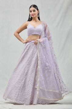 Lilac attached cancan lehenga with zari embroidery in checkered pattern. Paired with a padded embroidered blouse and embroidered dupatta. - Aza Fashions Designer Net Sets For Navratri, Navratri Designer Net Sets, Fitted Net Sharara With Cutdana, Elegant Net Sets For Navratri, Fitted Net Choli With Cutdana, Net Lehenga For Reception, Net Anarkali Lehenga, Diwali Net Sets With Cutdana, Lehenga Pattern