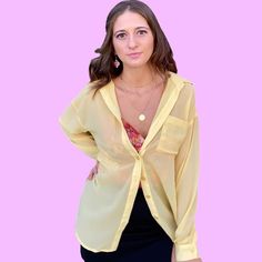 Add a pop of color to your outfit with this lightweight slightly oversized yellow chiffon button up blouse. Wear this top all summer long in a variety of different ways from wearing it open over your favorite fit, or even over a bathing suit! The slight transparency of this blouse allows your outfit to shine through. The high low cut also allows you to tie the bottom for a crop style, or you can simply wear buttoned up with pants. Styles are endless with this beautiful flowy blouse. Yellow Long Sleeve, Crop Style, Summer Plans, Sunshine Yellow, Flowy Blouse, Button Up Blouse, Cropped Style, Trendy Accessories, To Shine