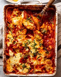 a casserole dish with meat and cheese